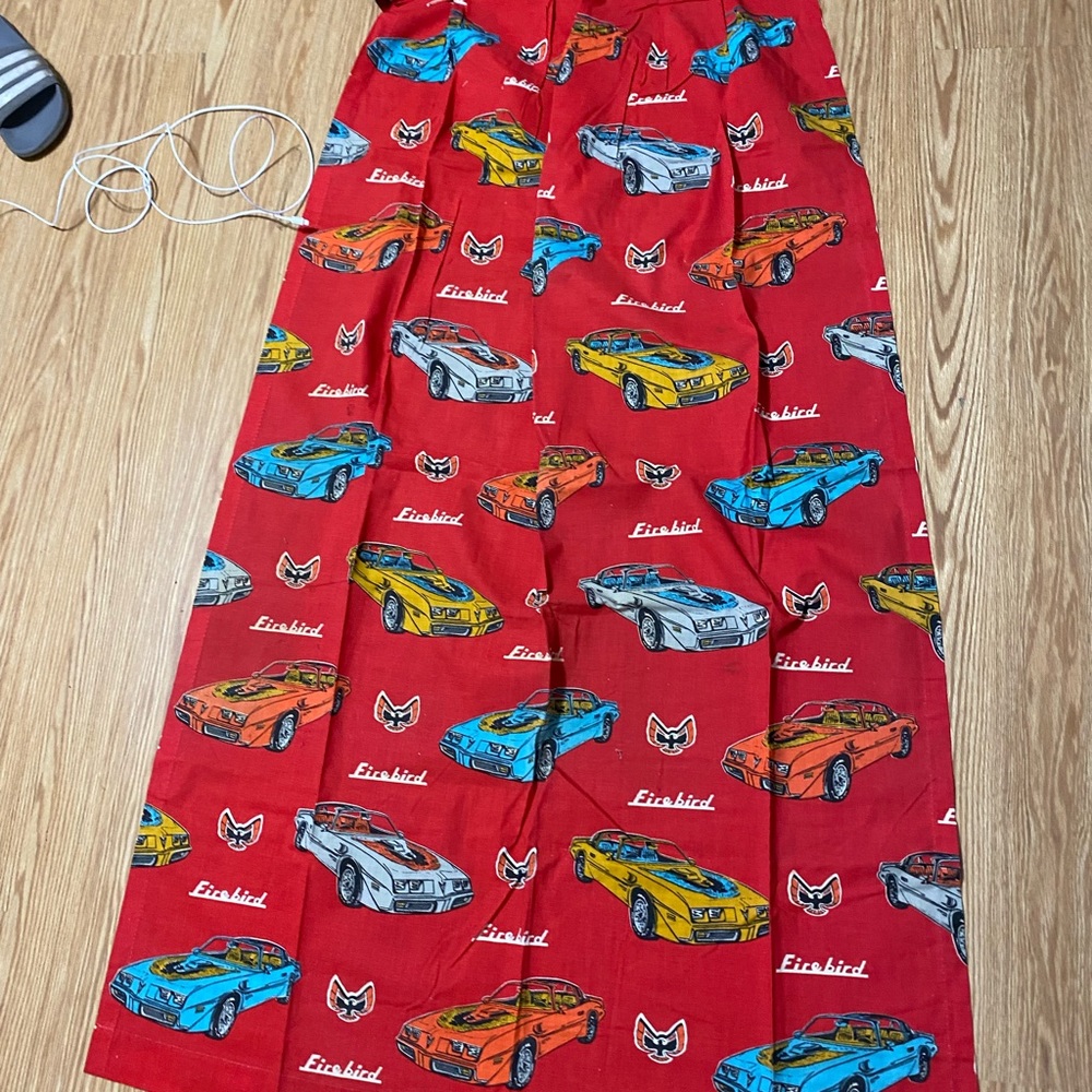 One set of curtains, 63” long 23” wide